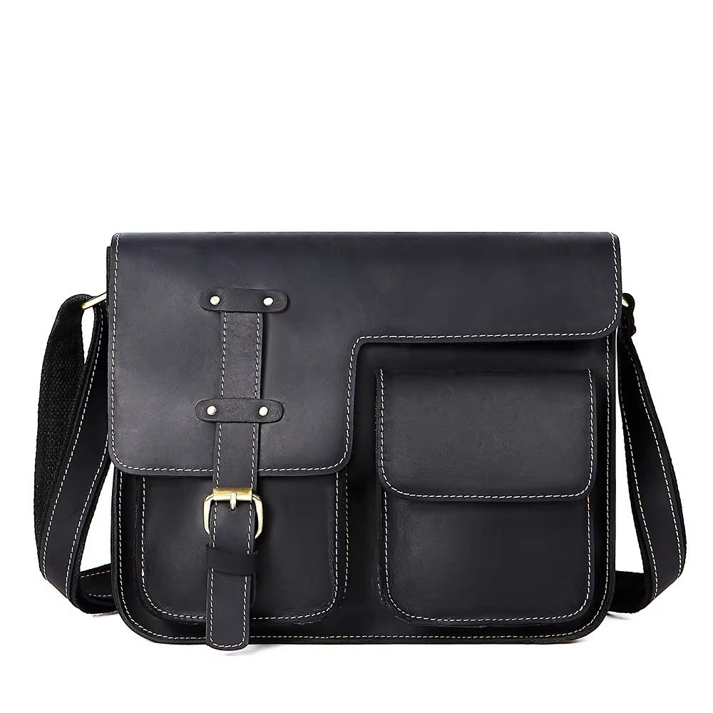 Barcon Getta Inc black full grain Ethiopian leather messenger bag with multiple pockets and brass buckle.