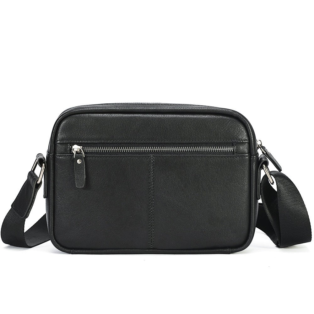 Barcon Getta Inc black full grain Ethiopian leather everyday sling shoulder bag with front zipper pocket and adjustable strap.
