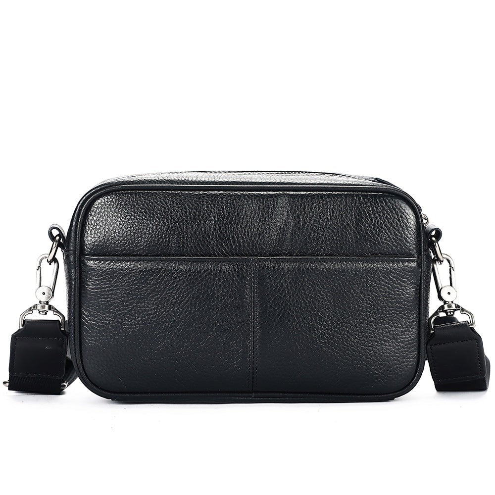 Barcon Getta Inc black full grain Ethiopian leather shoulder bag with front and back zipper pockets.