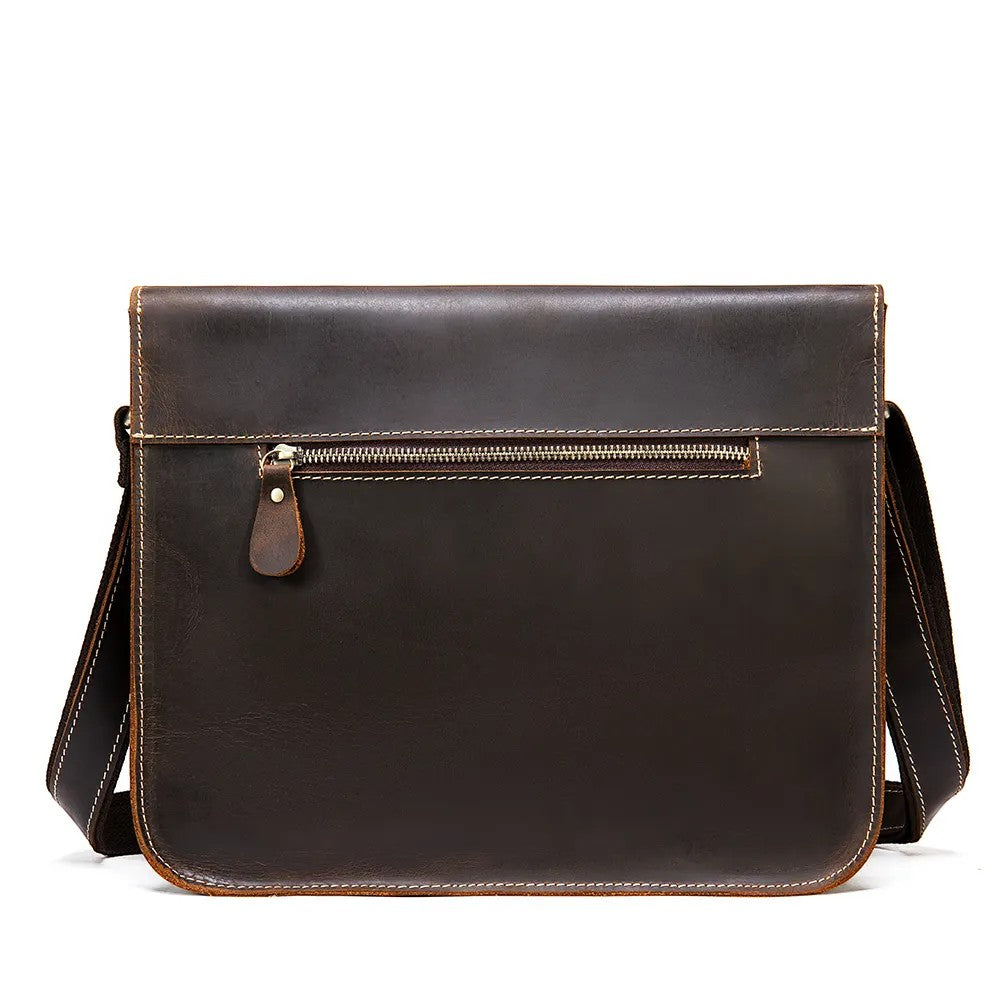 Barcon Getta Inc dark brown full grain leather messenger bag with zipper pocket and adjustable strap.