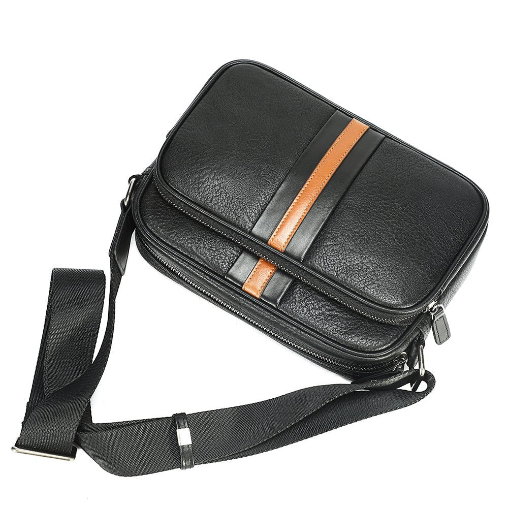 Barcon Getta Inc black full grain leather shoulder bag with tan stripe detail and adjustable strap.