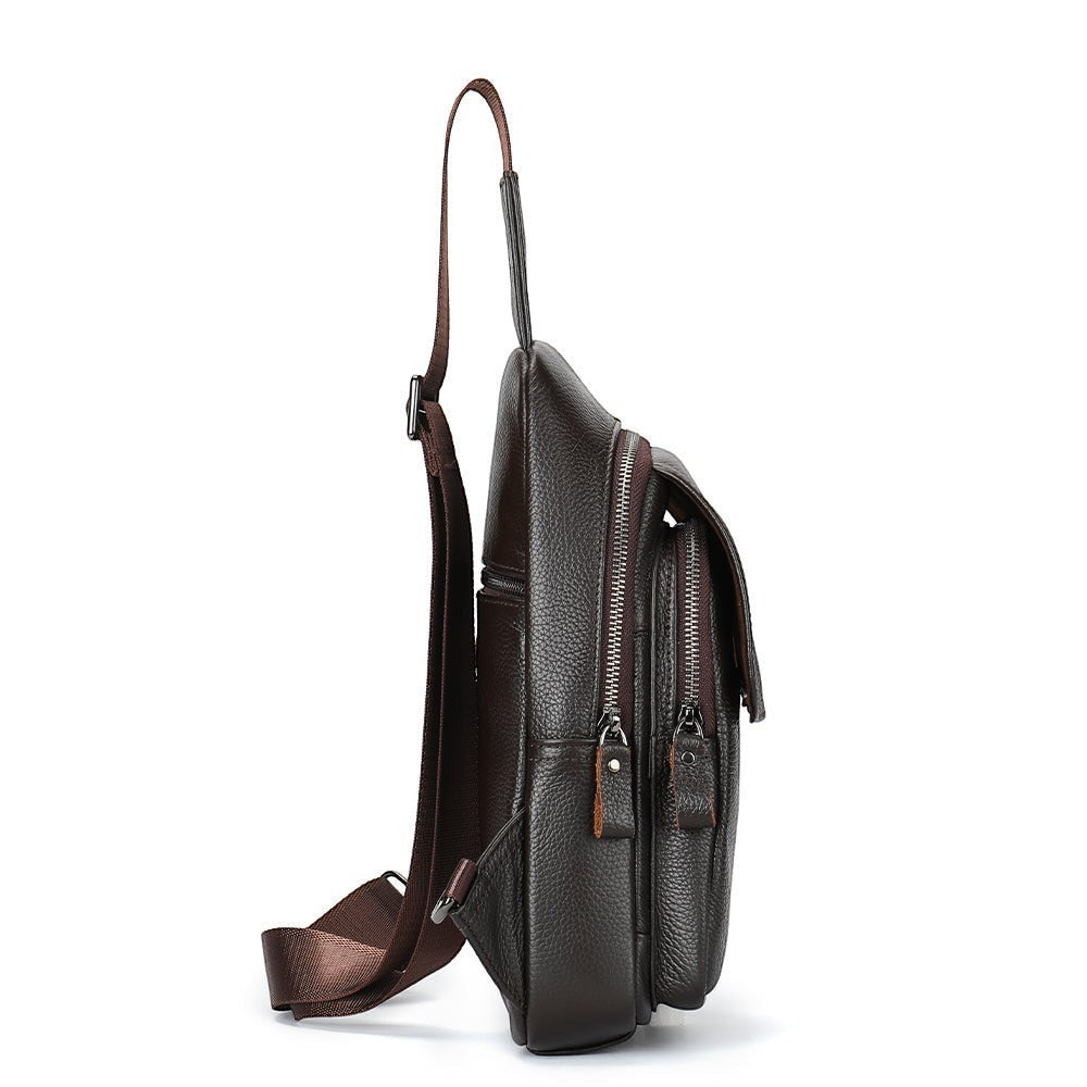 Barcon Getta Inc RIDGELINE brown textured leather cross-body bag with multiple zippered pockets and adjustable strap.