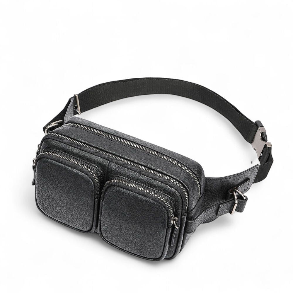 Barcon Getta Inc black genuine leather SlimCarry cross-body bag with multiple zipper pockets and adjustable strap.