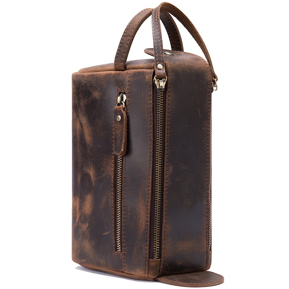 Barcon Getta Inc dark brown full grain leather dopp case with multiple zippered compartments and top handles.