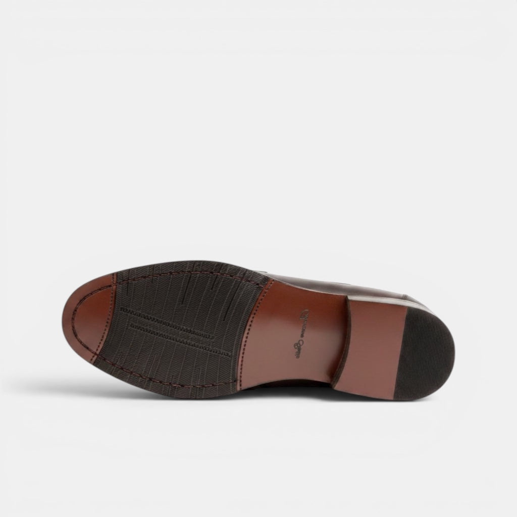 Barcon Getta Inc ABUJA Penny Loafer in dark brown leather with traditional penny strap detail and durable sole.