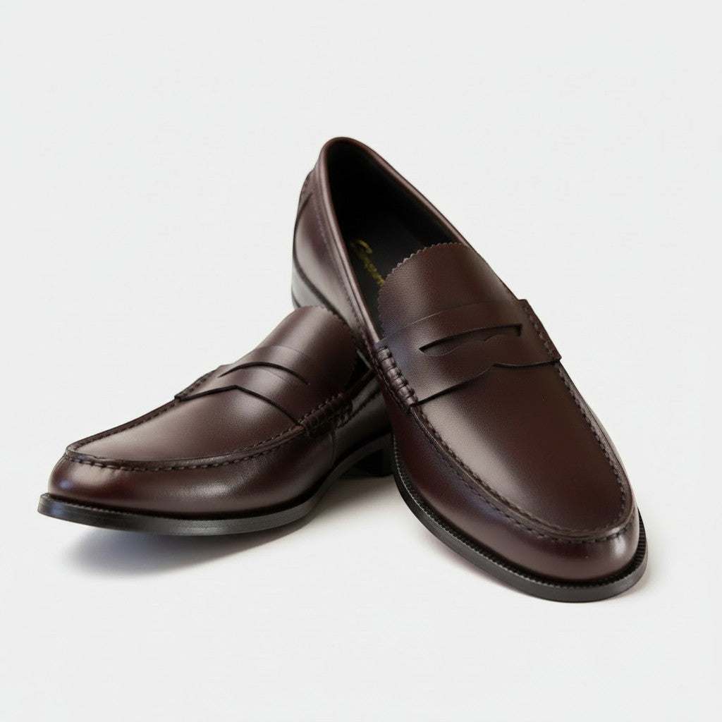 Barcon Getta Inc ABUJA Penny Loafer in dark brown leather with traditional penny strap detailing.