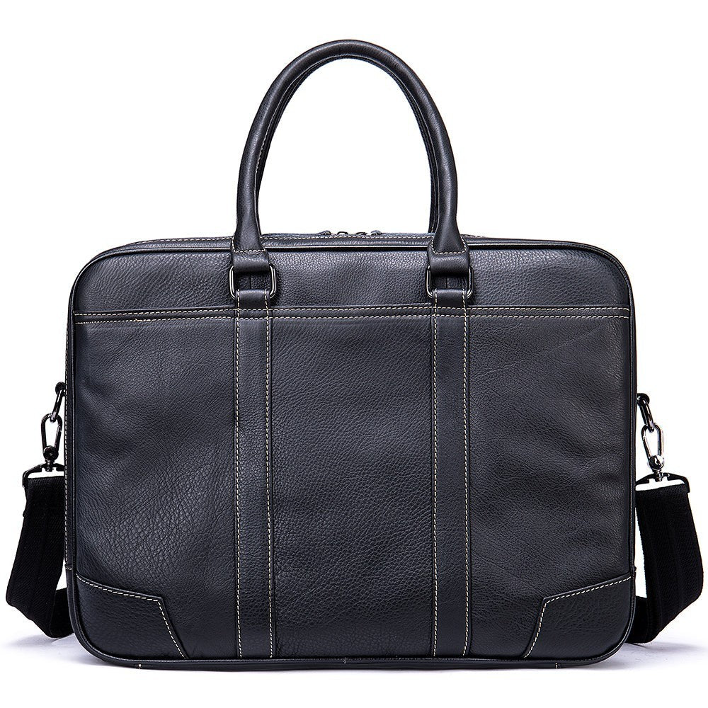 Barcon Getta Inc black leather briefcase with double zippers, contrast stitching, and detachable shoulder strap. Fits up to 16" laptop.