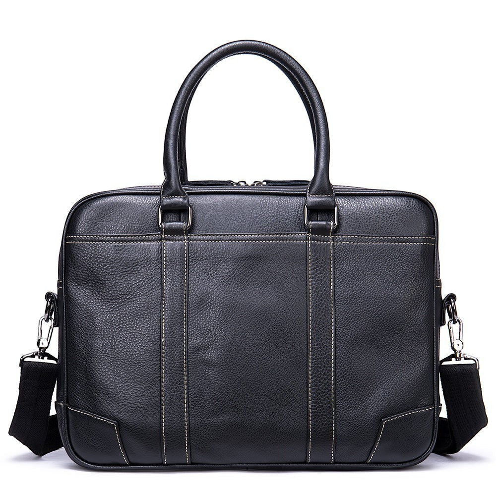 Barcon Getta Inc black Ethiopian leather briefcase with contrast stitching, top handles, and detachable strap. Fits up to 16" laptop.