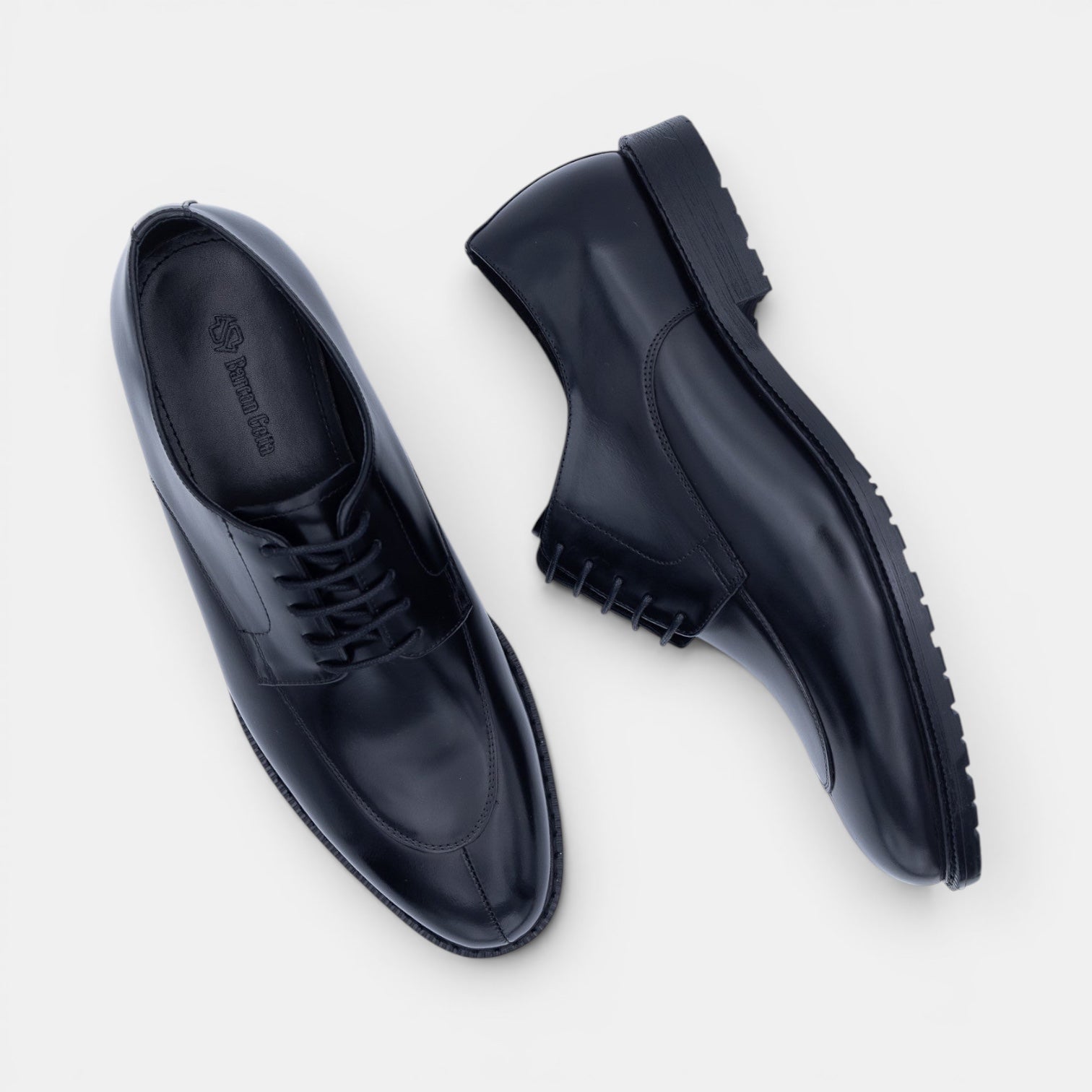 Barcon Getta Inc. black full grain leather split toe Derby dress shoes with lug sole.