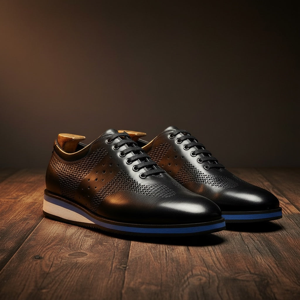 Barcon Getta Inc black full grain leather dress shoes with perforated quarter panels and blue stripe midsole.