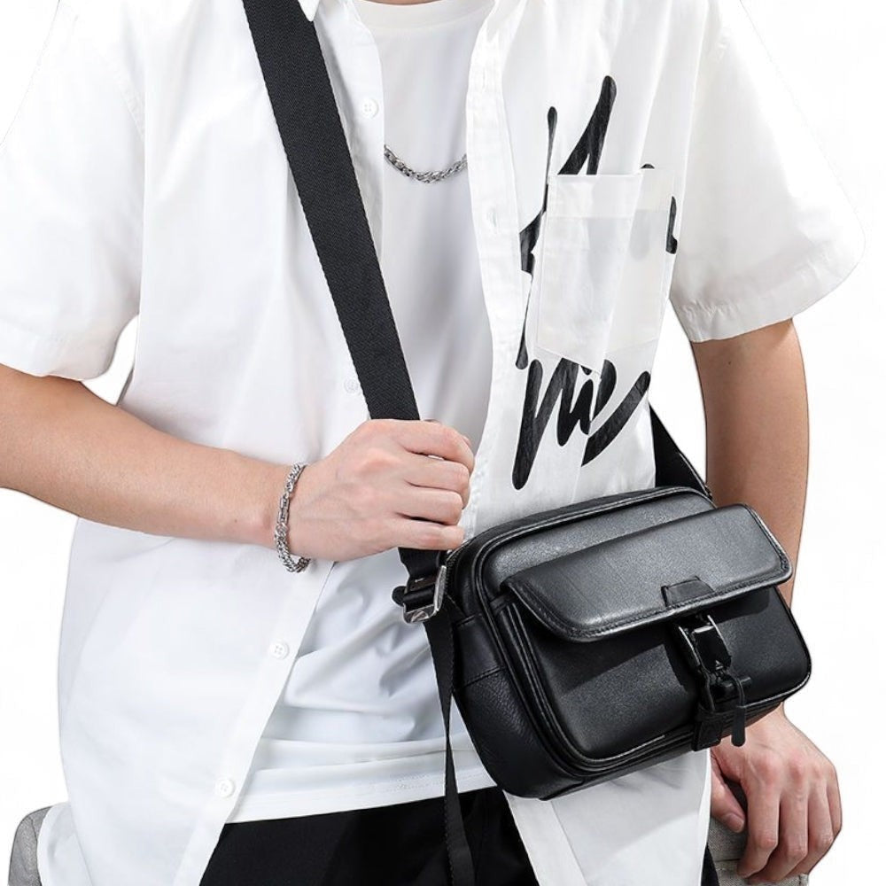 Barcon Getta Inc black full grain leather UrbanSide shoulder bag with buckle closure and multiple compartments.
