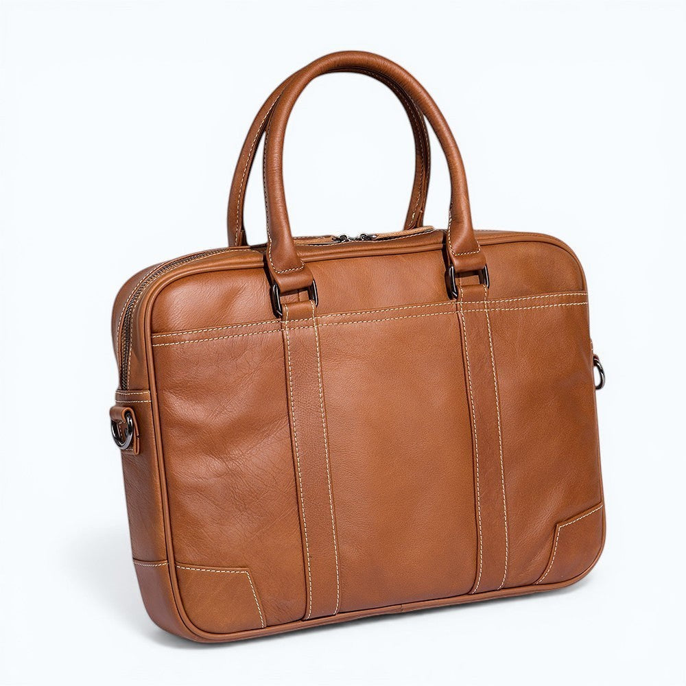 Barcon Getta Inc brown Ethiopian leather briefcase with top handles, multiple pockets, and space for a 16" laptop.