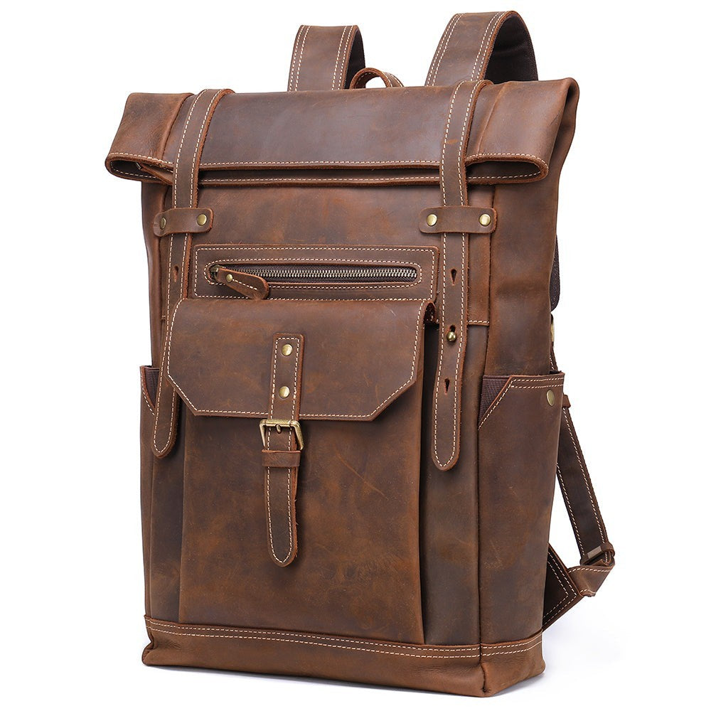 Barcon Getta Inc NOMAD brown Ethiopian leather roll-top backpack with buckle closure and multiple pockets.