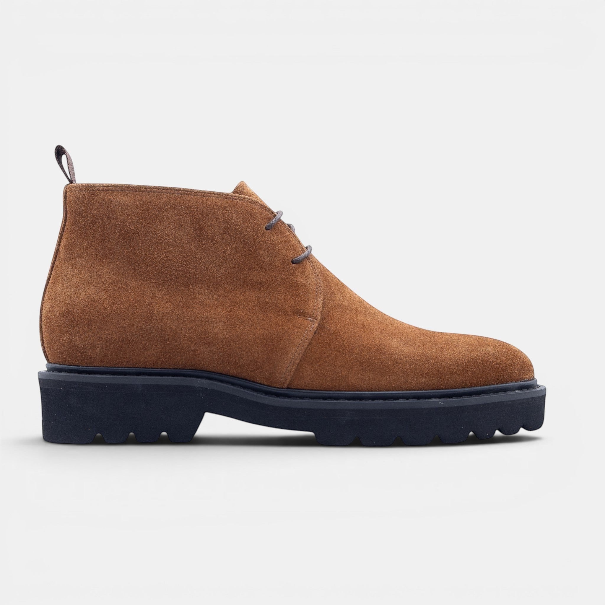 Barcon Getta Inc brown suede chukka boots with a thick lug sole and lace-up closure.