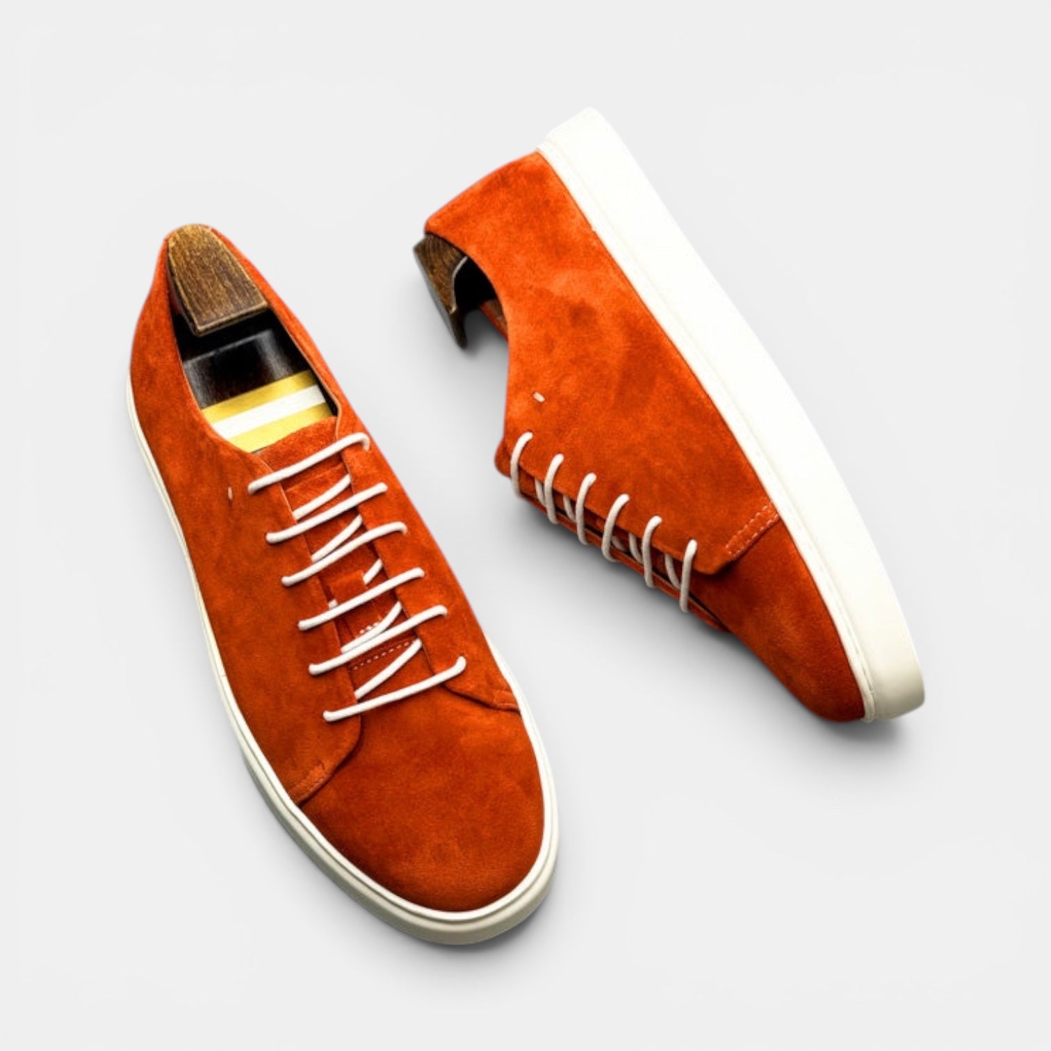 Barcon Getta Inc MEDA LOW TOP SUEDE sneakers in burnt orange suede with white laces and white soles.