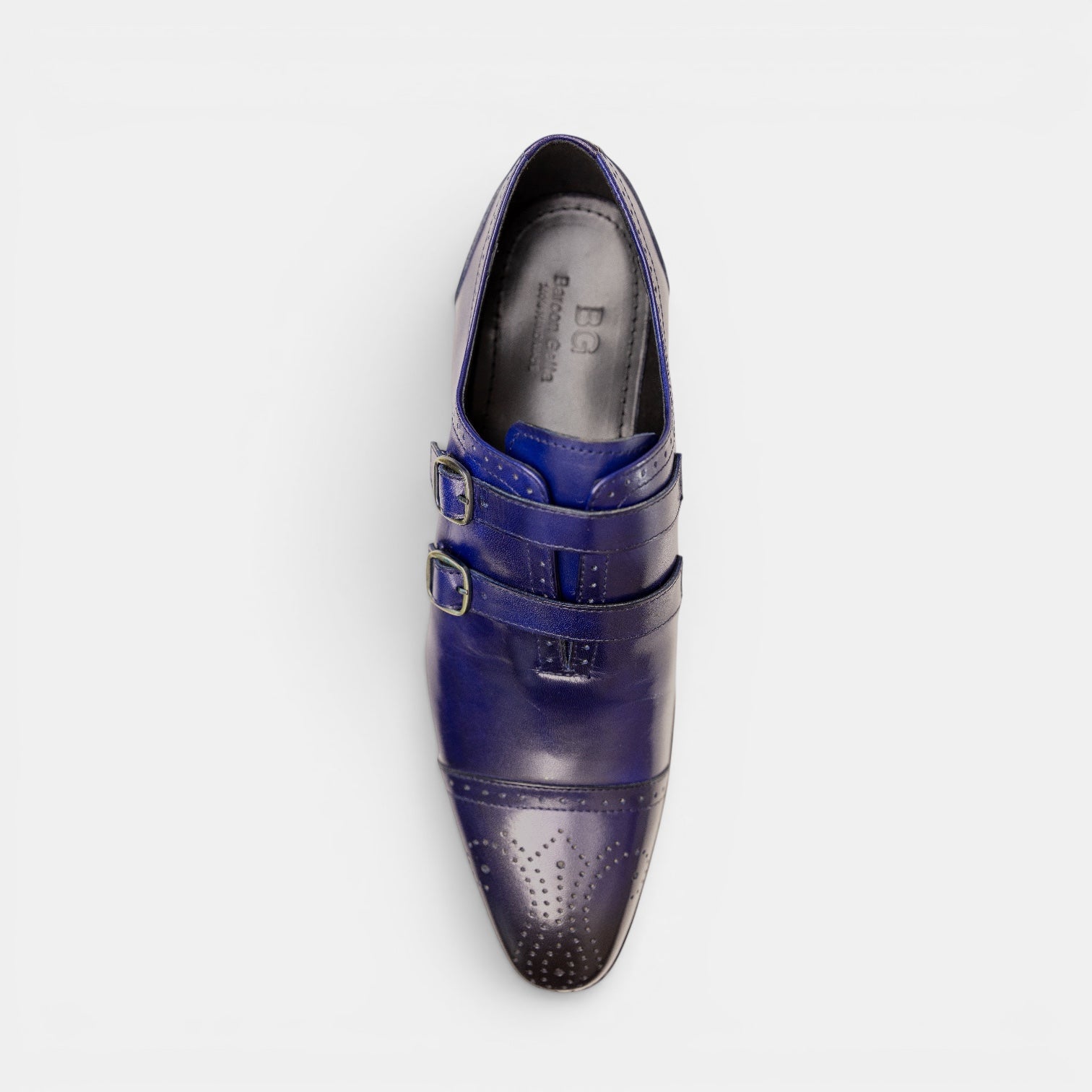 Barcon Getta Inc CAIRO double monk strap dress shoes in hand-burnished cobalt blue full grain leather with gold buckles and brogue detailing.
