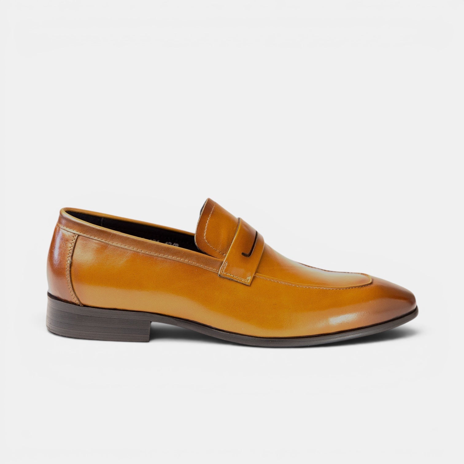 Barcon Getta Inc CONAKRY amber tan patina full grain leather penny loafer with a smooth upper and hybrid sole.