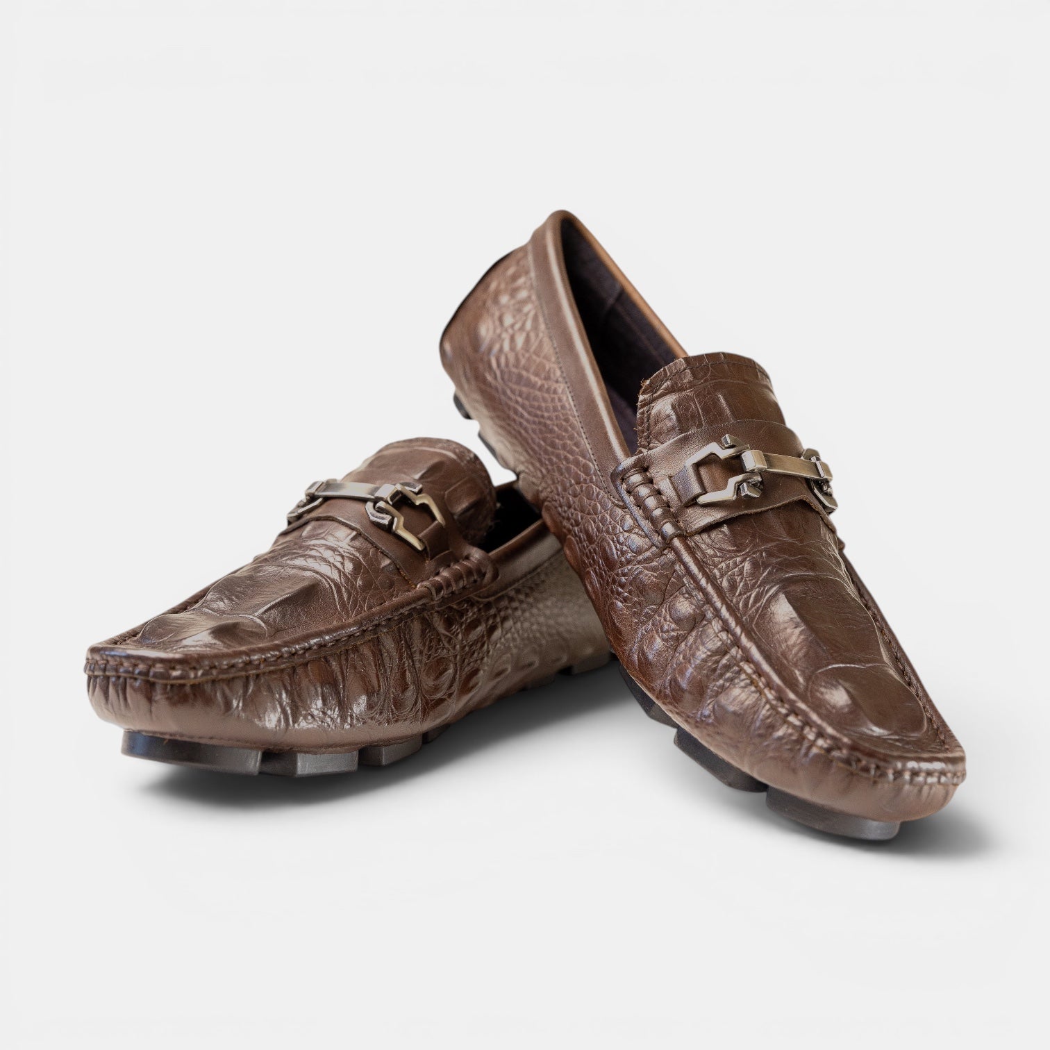 Barcon Getta Inc ARBA-MINCH taupe/mocha brown crocodile-embossed leather driving loafers with gunmetal snaffle bit.