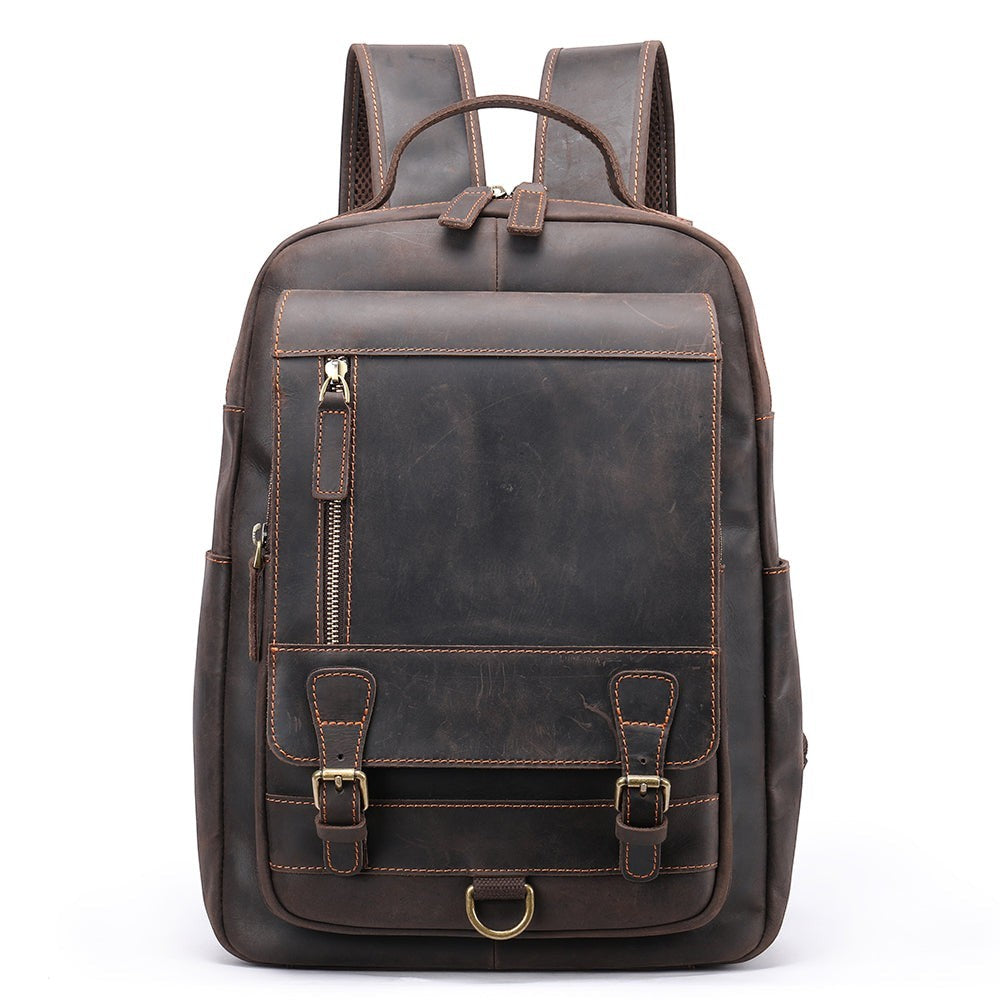 Barcon Getta Inc dark brown genuine leather backpack with multiple compartments and adjustable padded straps.