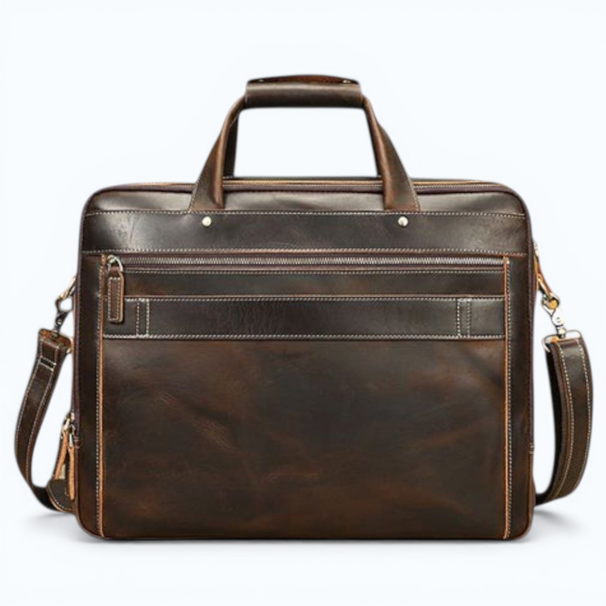 Barcon Getta Inc dark brown distressed leather briefcase with top handles, adjustable strap, and multiple pockets. Fits up to 16" laptop.