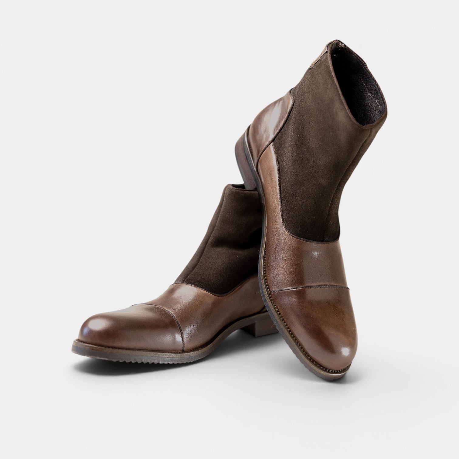 Barcon Getta Inc DJIBOUTI brown leather and suede ankle boots with cap toe and back zipper.