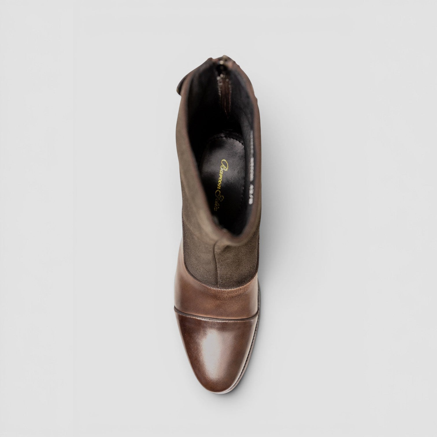 Barcon Getta Inc DJIBOUTI brown leather and suede ankle boots with back zipper and cap-toe detail.