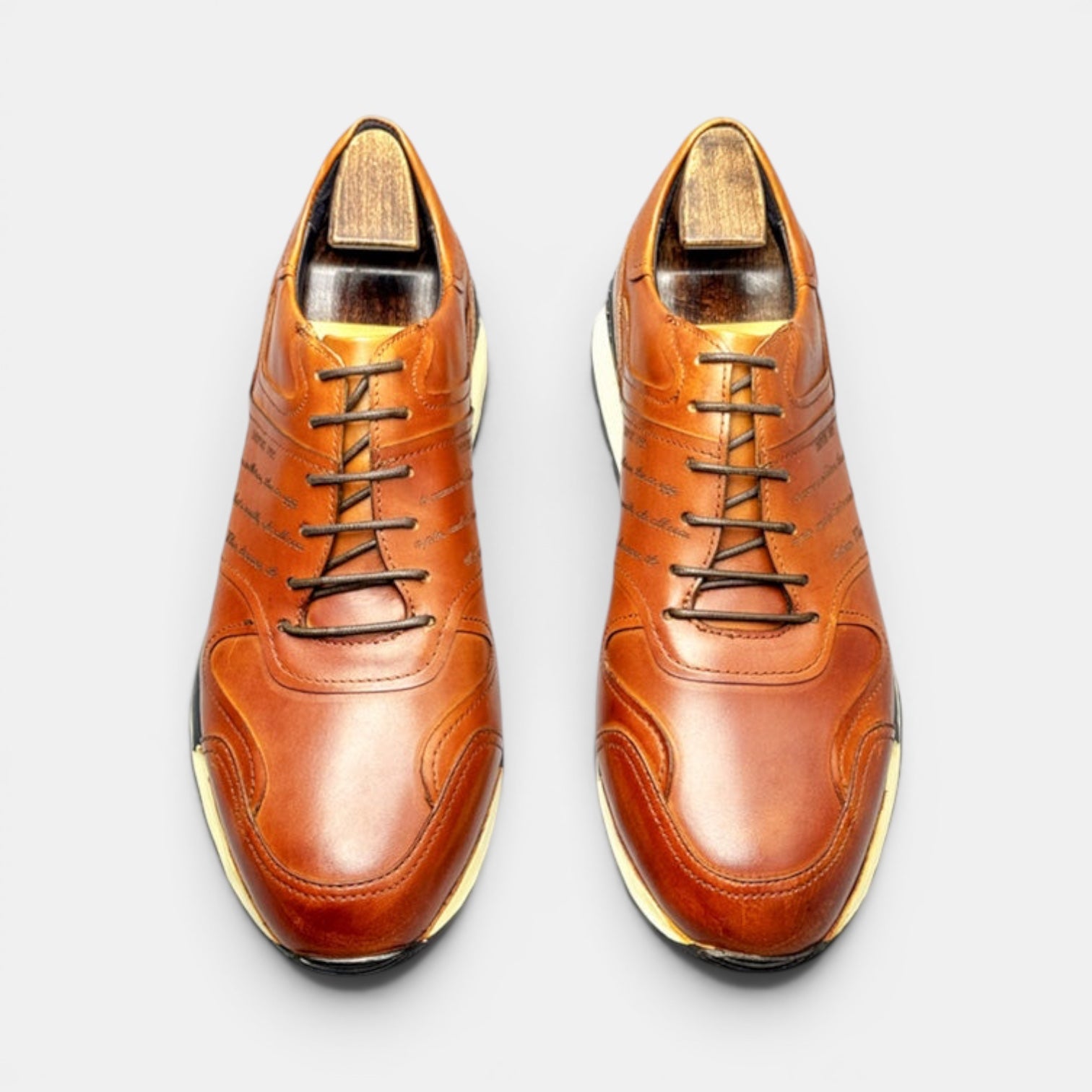 Barcon Getta Inc FREETOWN casual cognac tan leather sneakers with cap toe and lug sole.