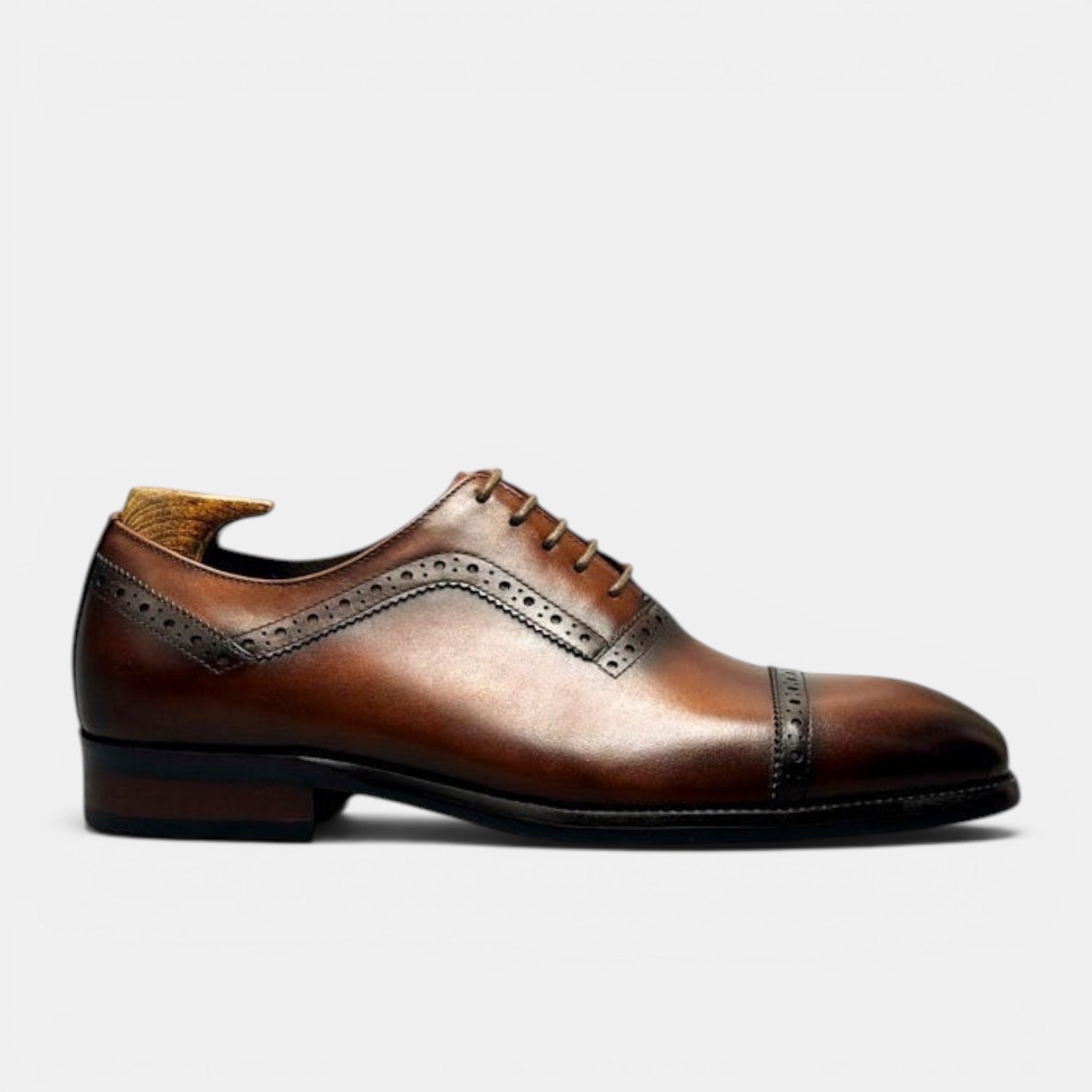 Barcon Getta Inc GITEGA brown full grain leather cap toe Oxford dress shoes with brogue detailing.