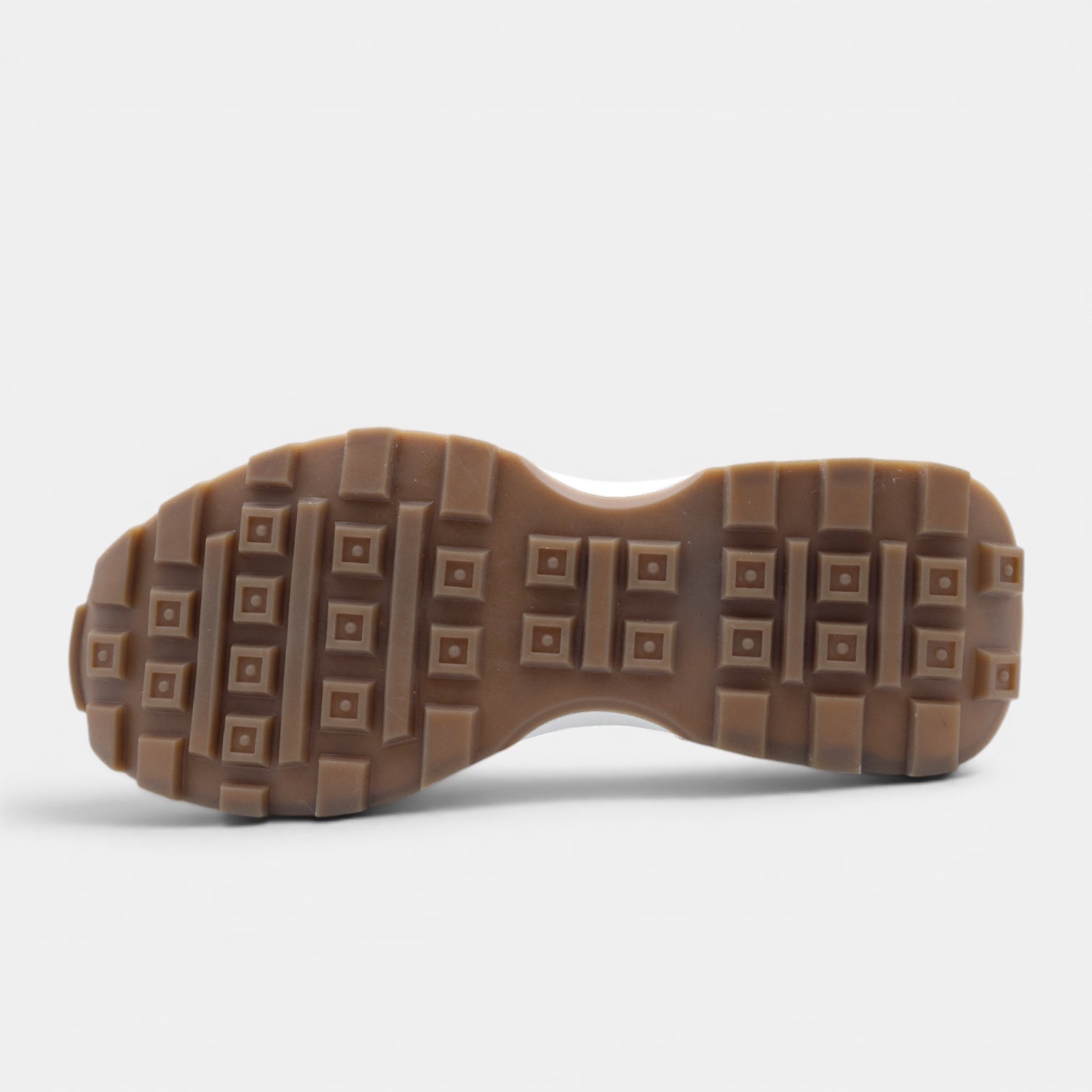 Barcon Getta Inc GUYA sneaker outsole with square-grid tread in caramel gum rubber and white EVA midsole.