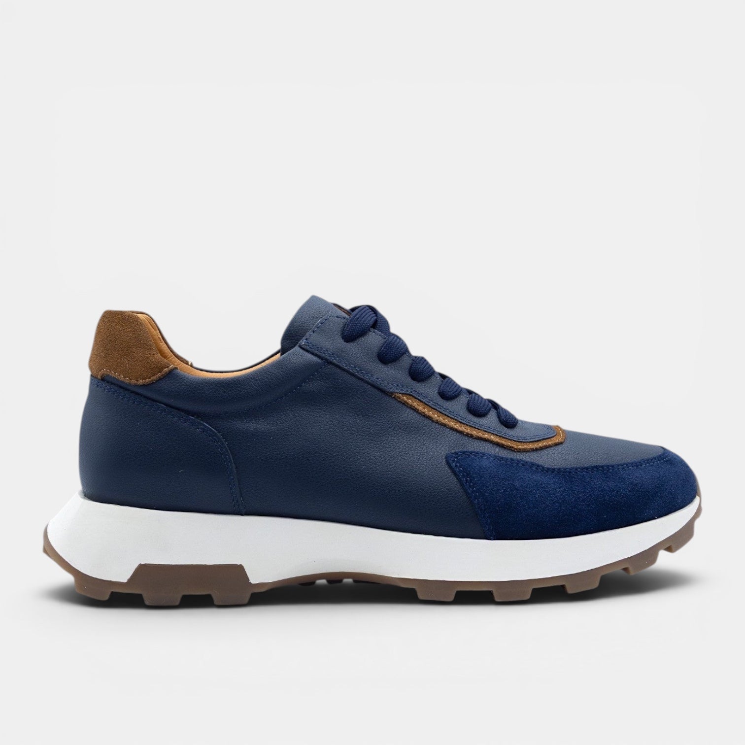 Barcon Getta Inc GUYA sneaker in dark navy leather with white and tan accents, gum sole.