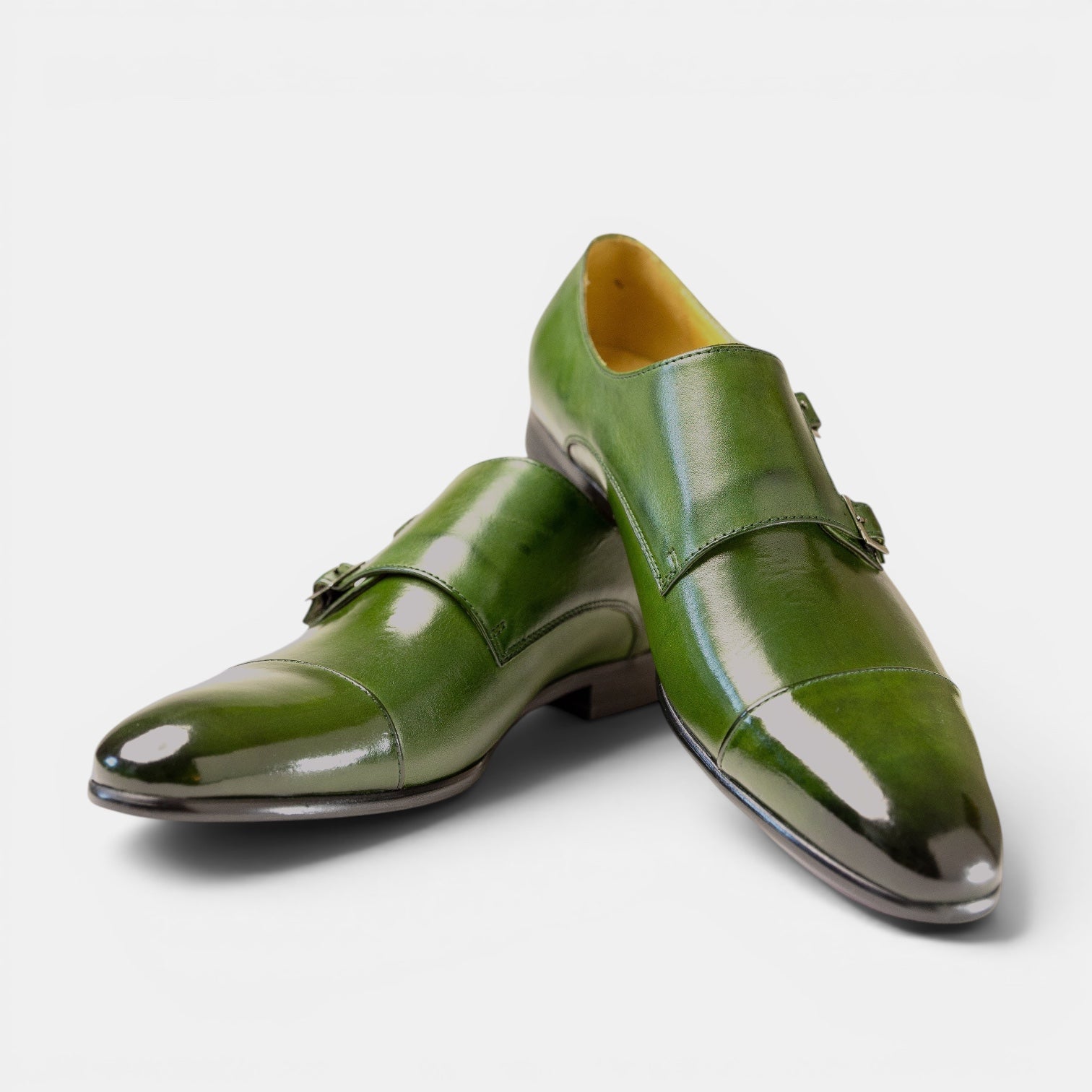 Barcon Getta Inc HARARE olive green full grain leather double monk strap dress shoes with silver buckles.