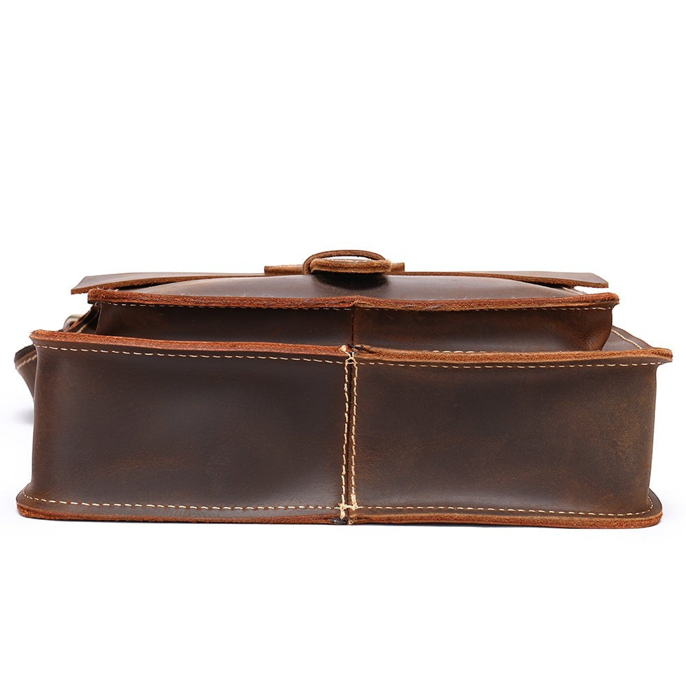 Barcon Getta Inc HARBORSIDE dark brown full grain leather shoulder bag with flap closure and exterior pockets.