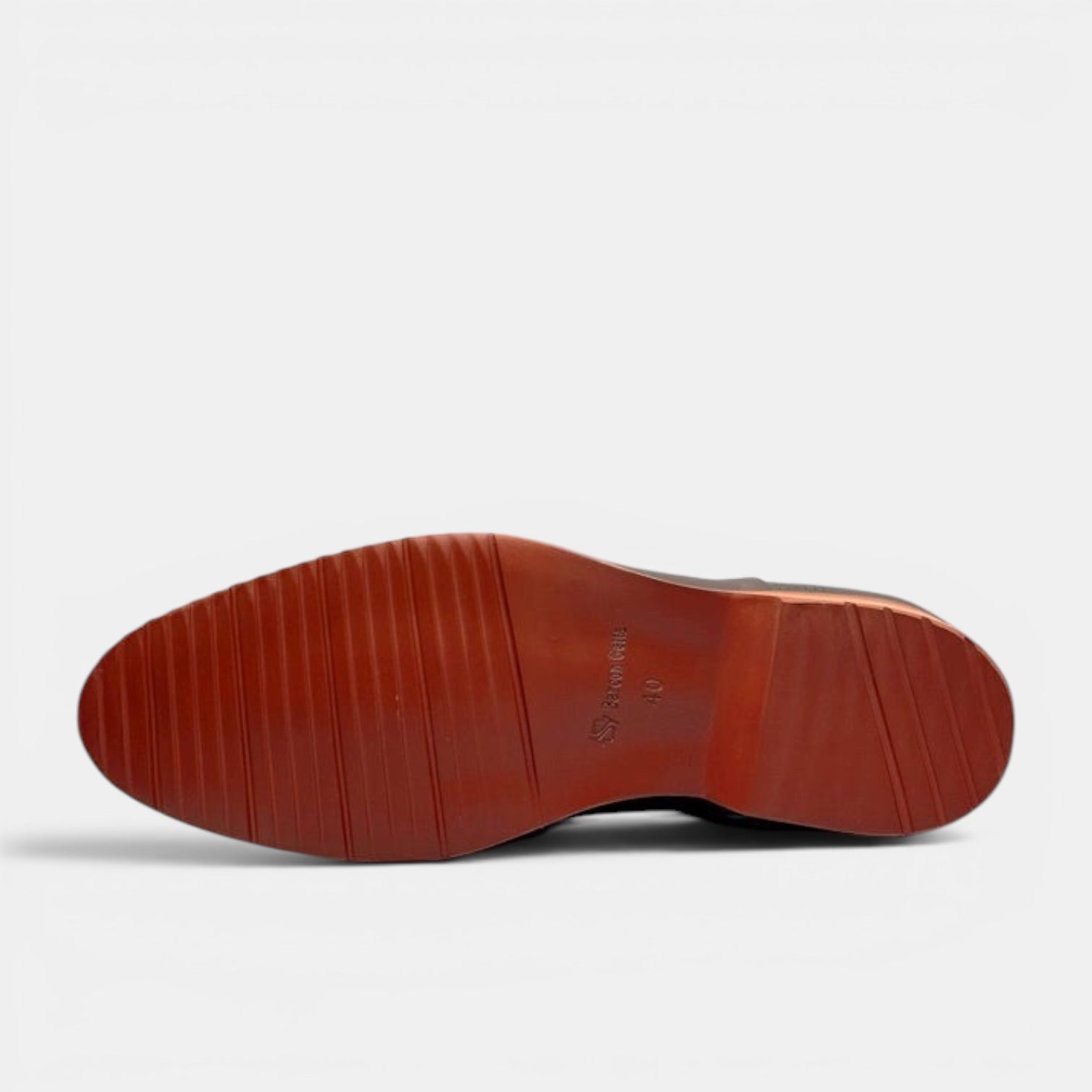 Barcon Getta Inc KIGALI Oxford dress shoes in oxblood burgundy with a burnt orange rubber sole and fine ribbed tread.