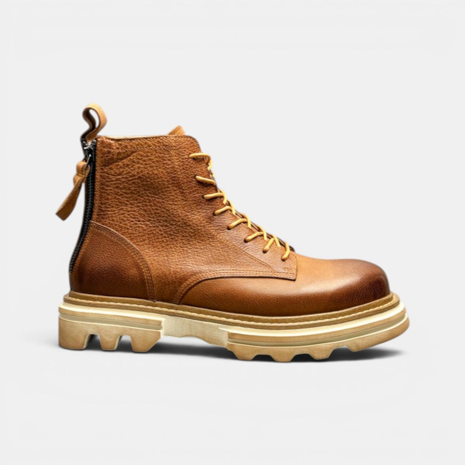 Barcon Getta Inc Kilimanjaro tan full grain leather lace-up boots with back zipper and thick sole.
