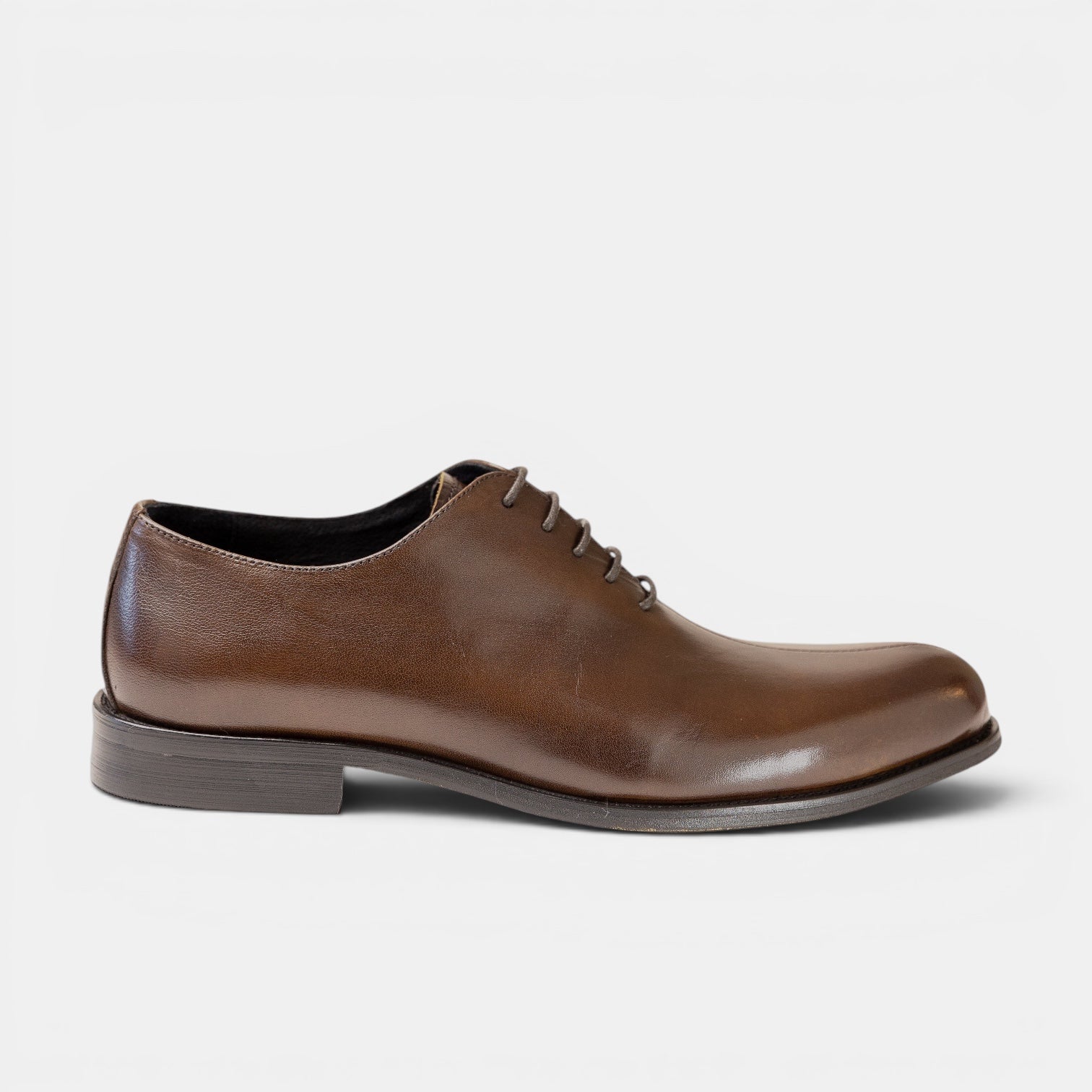 Barcon Getta Inc LOBAMBA whole-cut Oxford dress shoes in hand-burnished cognac brown full grain leather with a single vertical toe split seam.