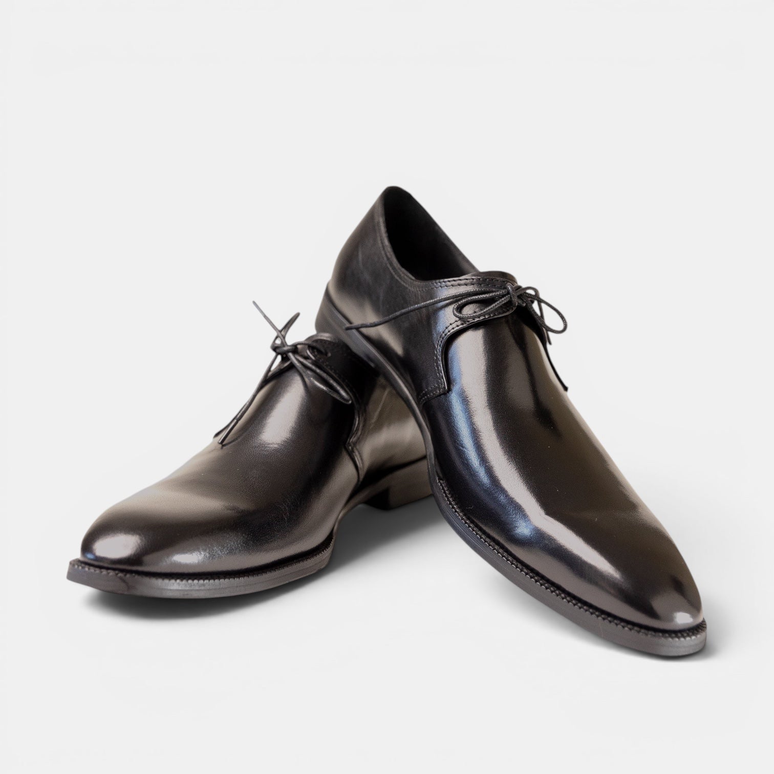 Barcon Getta Inc MALABO single lace derby dress shoes in black full grain leather with a pointed toe and slim silhouette.