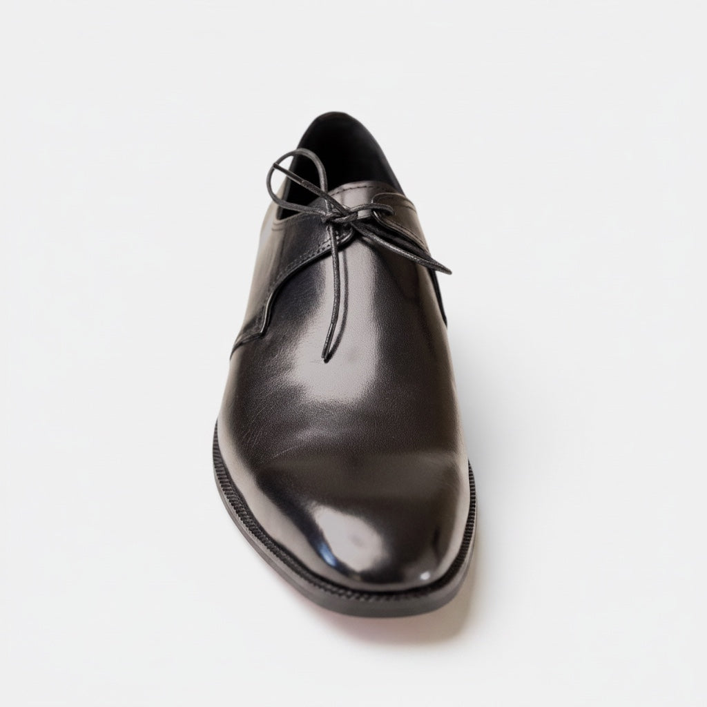 Barcon Getta Inc MALABO single lace derby dress shoe in charcoal black full grain leather with a pointed toe and single eyelet.