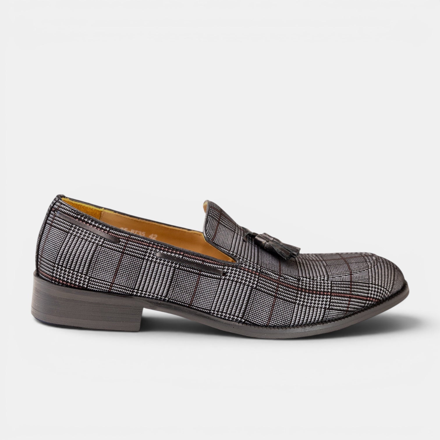 Barcon Getta Inc MASERU charcoal grey Glen plaid suede tassel loafer with a rounded toe and low stacked heel.