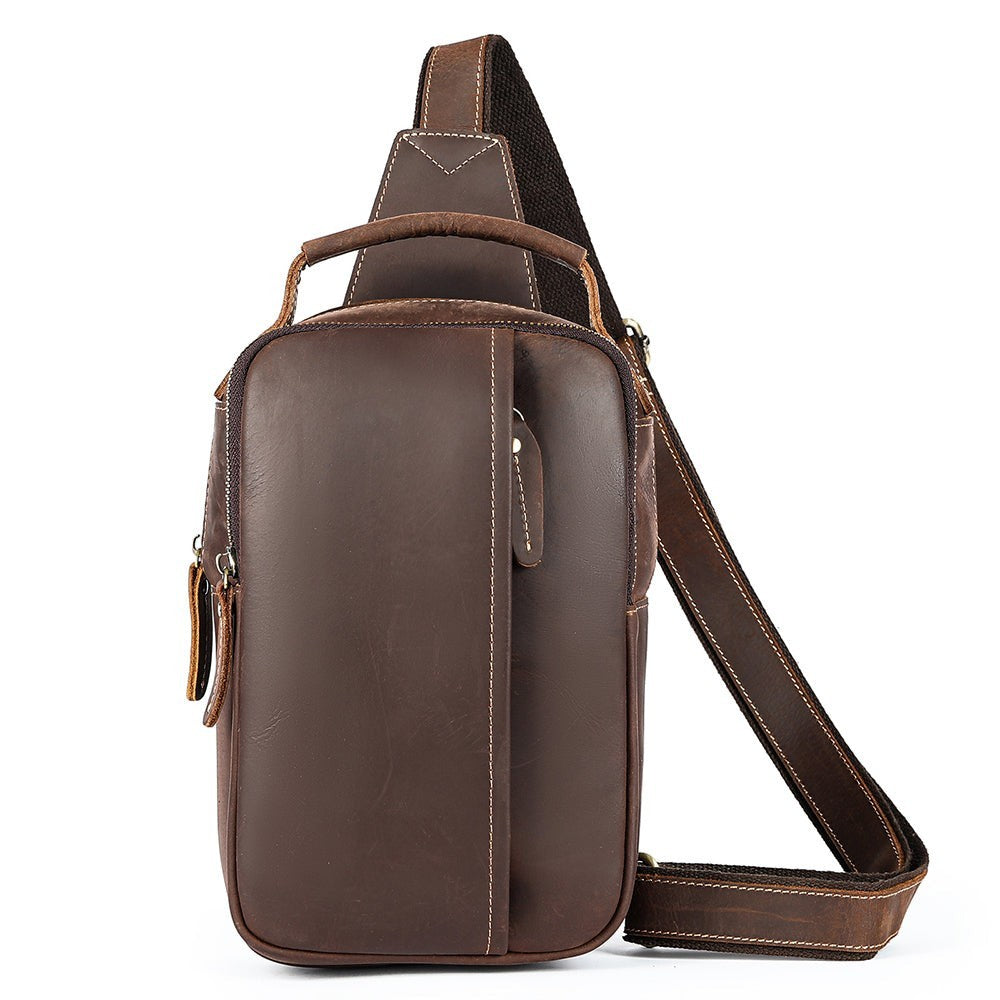 Barcon Getta Inc MERIDIAN dark brown genuine leather vertical cross-body bag with zippered compartments and adjustable strap.