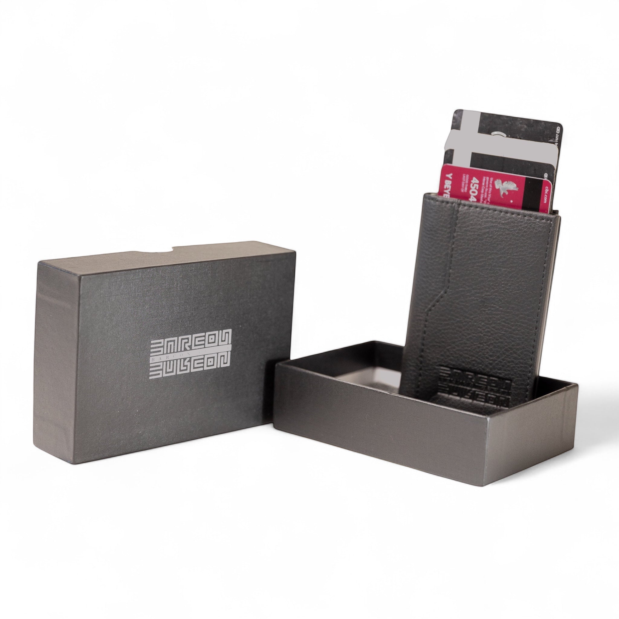 Barcon Getta Inc minimalist black full grain leather card holder wallet with 5 card capacity and 3 slots.