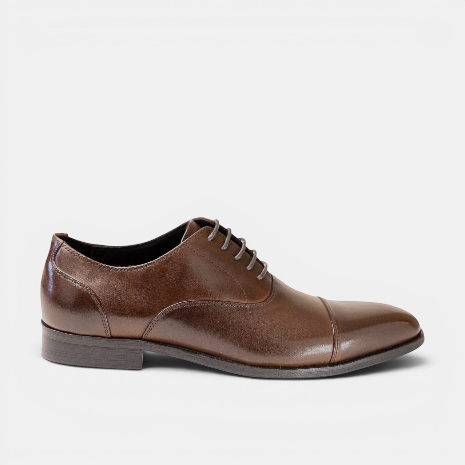 Barcon Getta Inc MOGADISHU burnished brown full grain leather cap toe Oxford dress shoe with closed lacing.