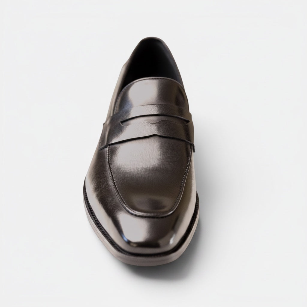 Barcon Getta Inc MONROVIA black high-polish full-grain leather penny loafer with hybrid sole.