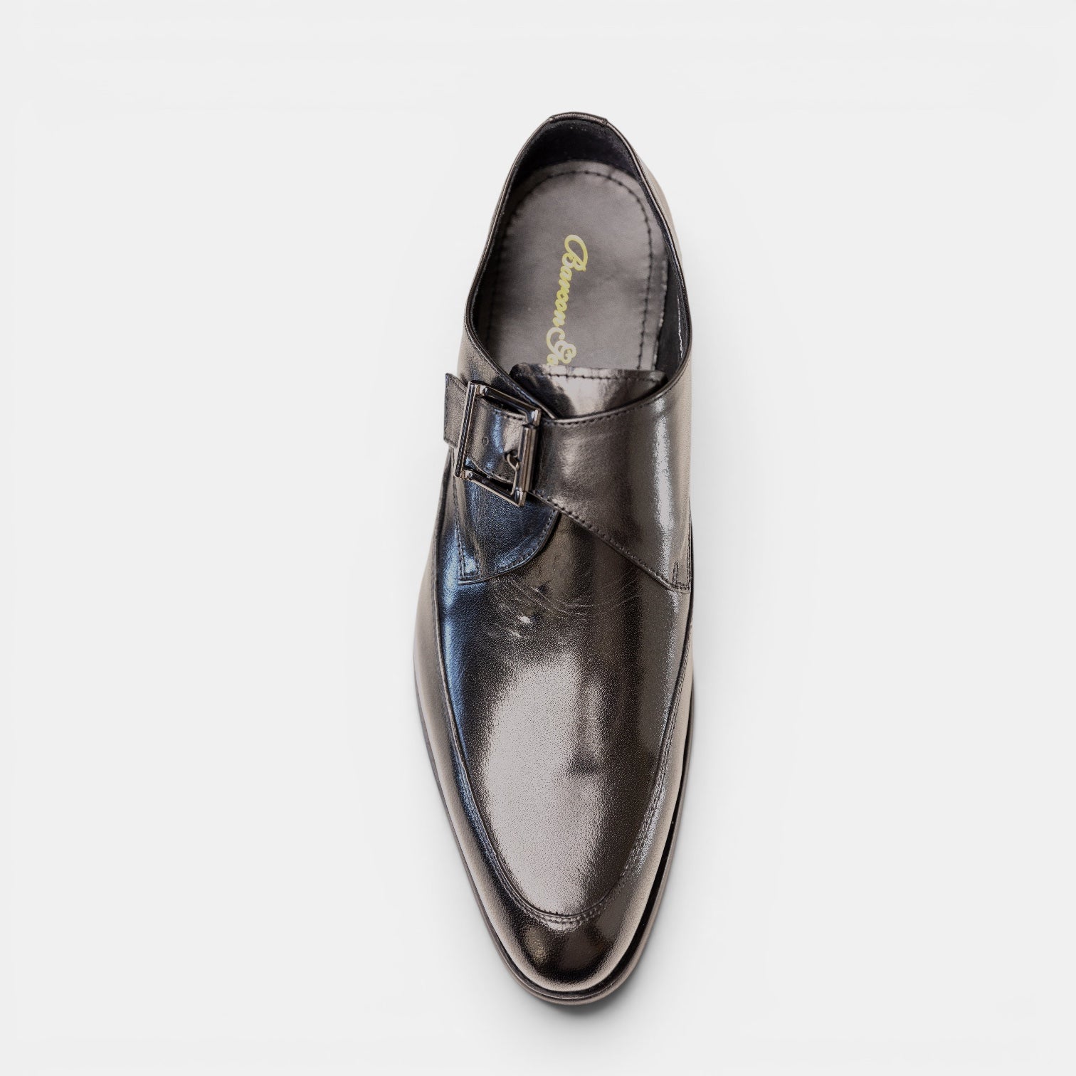 Barcon Getta Inc MORONI single monk strap dress shoes in gunmetal black full grain leather with blue iridescence and apron toe.