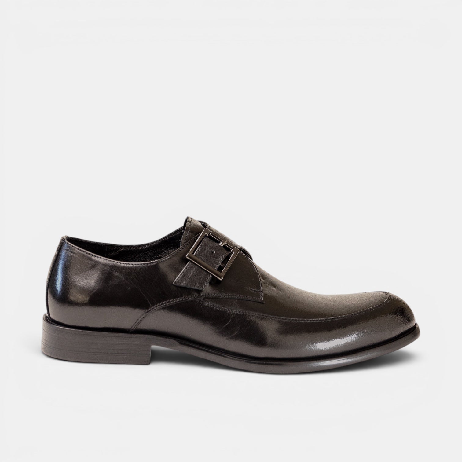 Barcon Getta Inc MORONI single monk strap dress shoes in gunmetal black full grain leather with blue iridescence and apron toe.