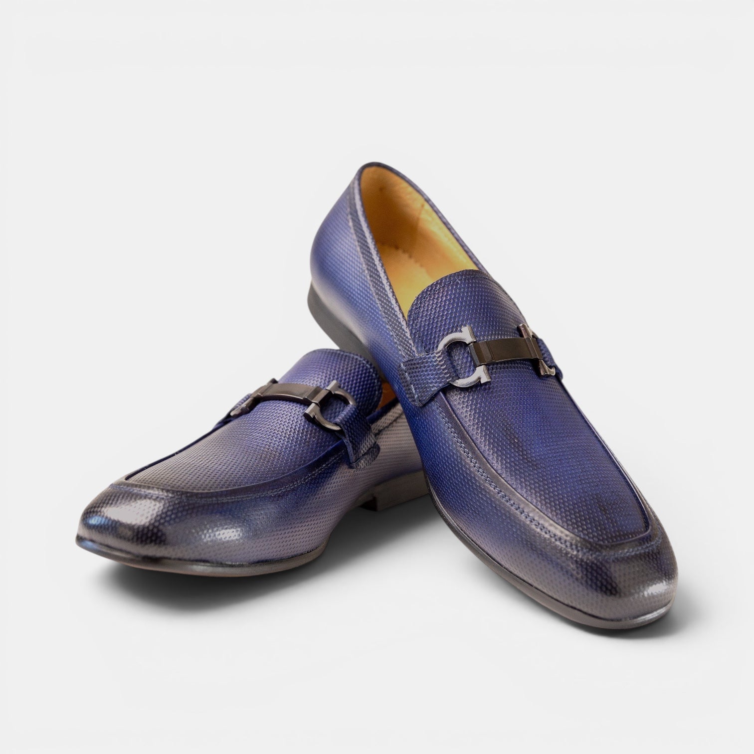 Barcon Getta Inc NAMPULA midnight navy blue textured full grain leather horsebit loafers with gunmetal hardware.