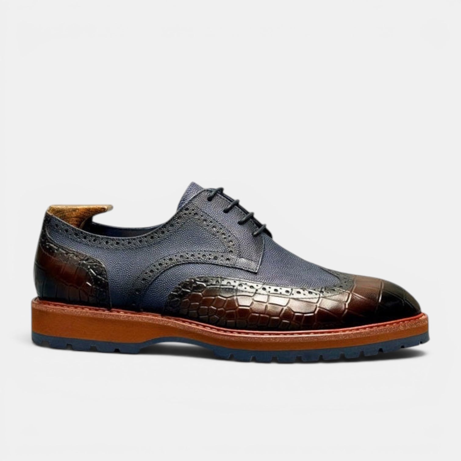 Barcon Getta Inc PORT-LOUIS navy leather wingtip brogues with croc-embossed brown toe and heel.