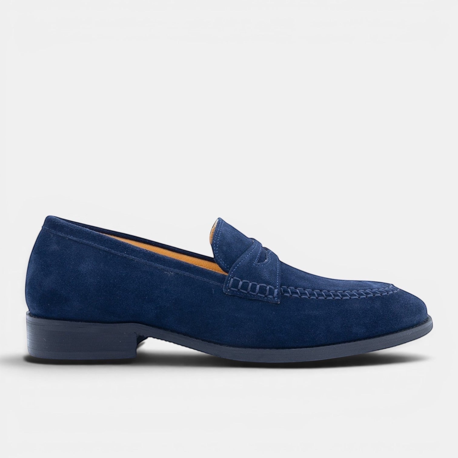 Barcon Getta Inc navy blue suede PHAROAH penny loafer with hand-stitched moccasin toe and tan leather insole.