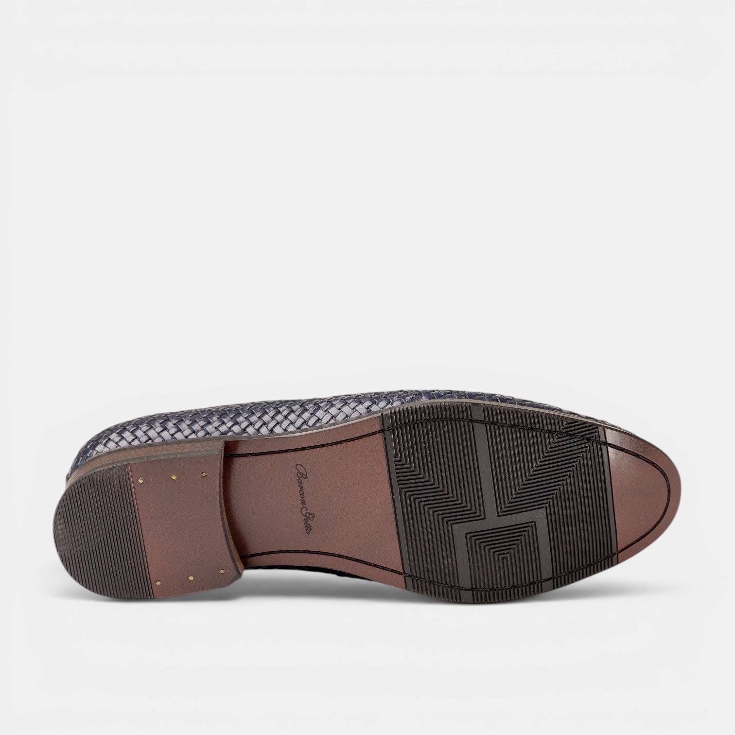 Barcon Getta Inc navy woven full grain leather penny loafer with hybrid sole and geometric tread.