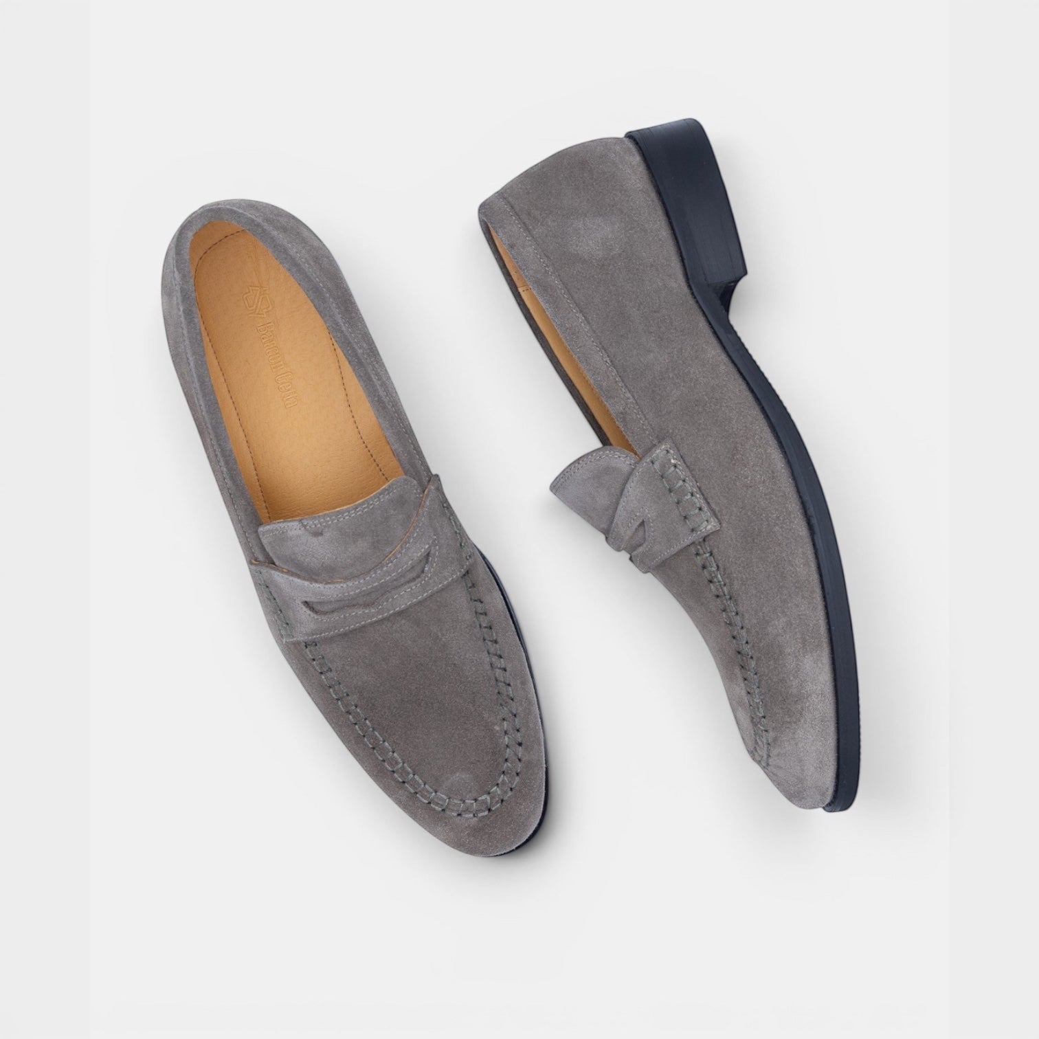 Barcon Getta Inc PHAROAH grey suede penny loafers with hand-stitched moccasin toe and tan leather insole.