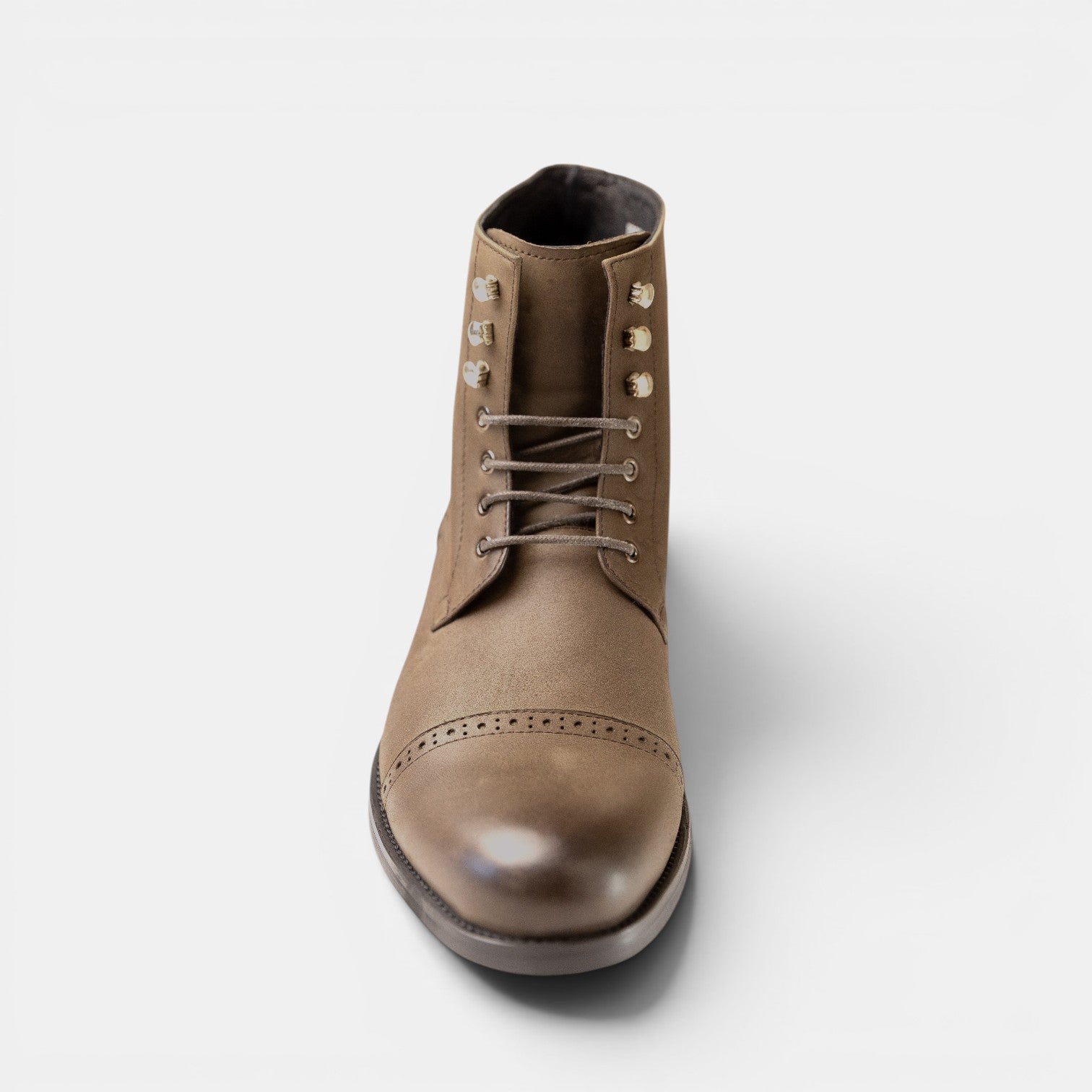 Barcon Getta Inc PRETORIA taupe suede leather cap toe boots with brogue detailing and gold eyelets.